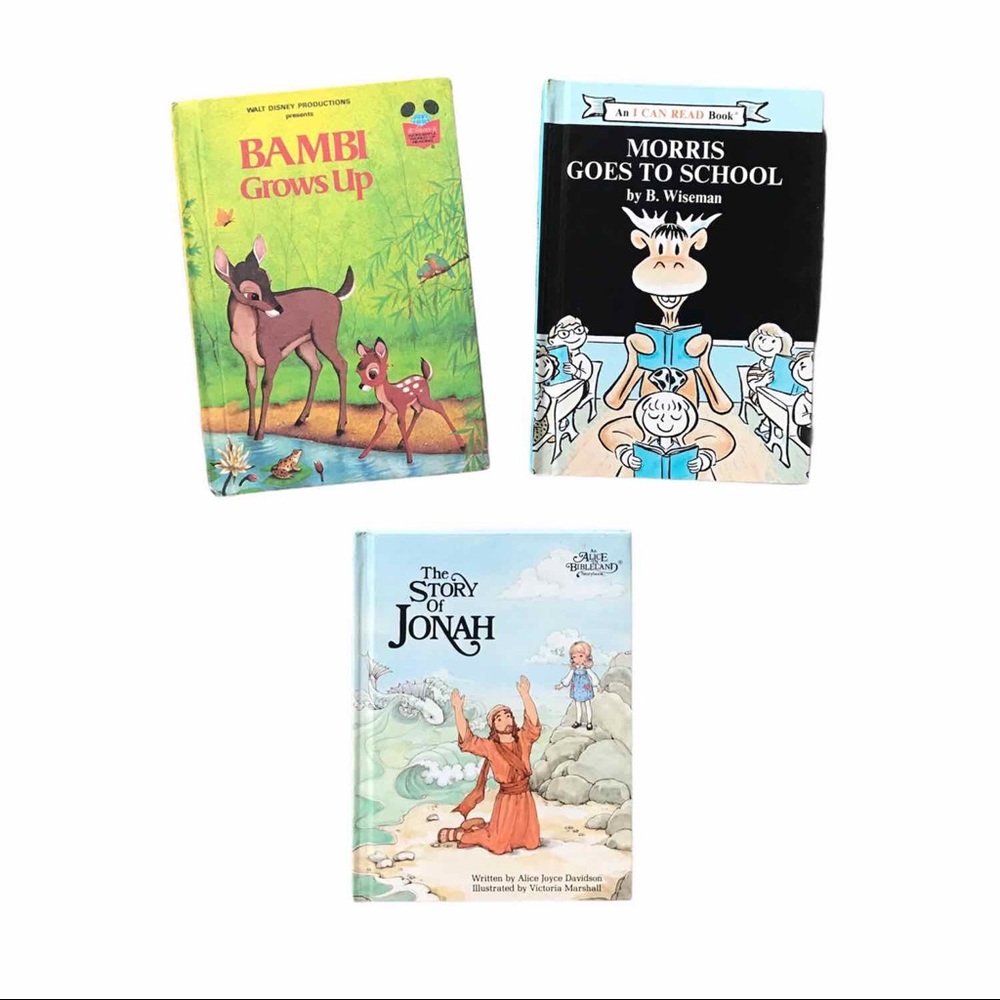 3 kids reading books